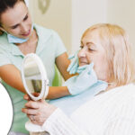 Elderly woman wearing dentures